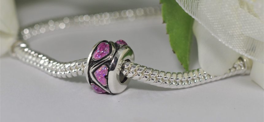 Pink stopper charm